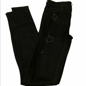Black high rise, ripped, skinny jeans.  Size 1L